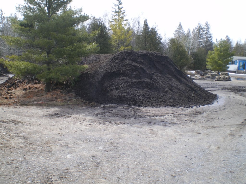 A pile of premium screened topsoil at our yard.