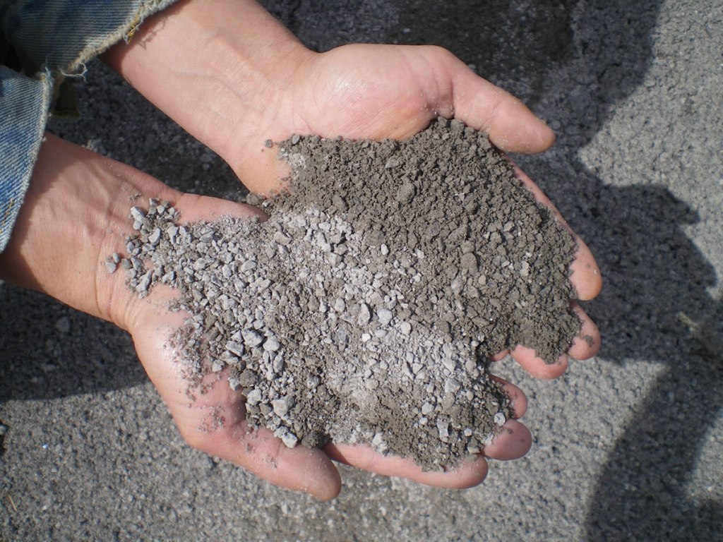 A handful of stone dust for size comparison
